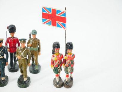 Set of 9 figures in painted composition,...