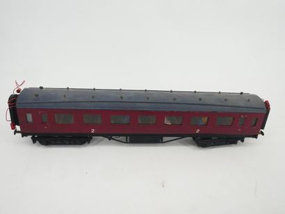 Painted metal and wood set (O gauge), including:
-...