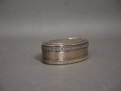 Oval silver and 950°/°° vermeil box with...