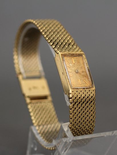 CYMA
Bracelet-montre de dame en or jaune...