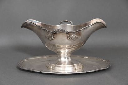 Double sauceboat with two leafy handles and...
