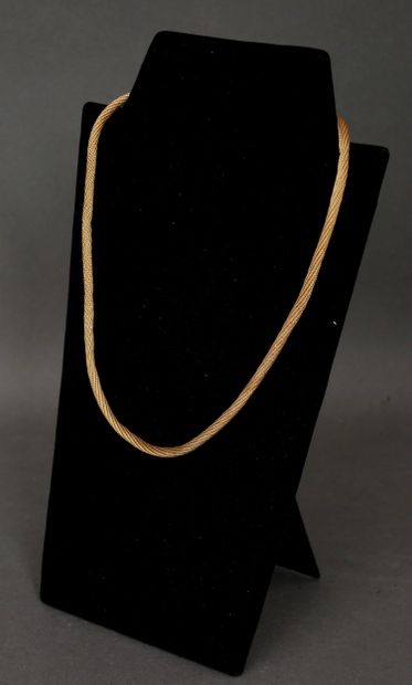 Collier tubogaz torsadé en or jaune 18k.
L...