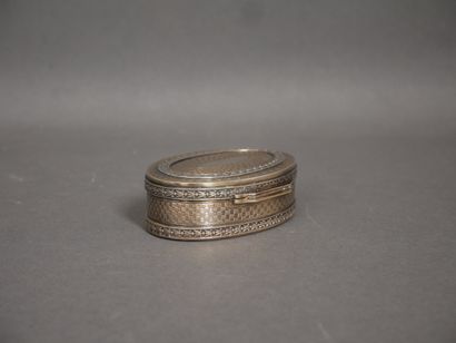 Oval silver and 950°/°° vermeil box with...