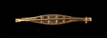 Broche ligne en or jaune 18k sertis de roses,...