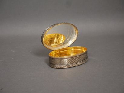 Oval silver and 950°/°° vermeil box with...