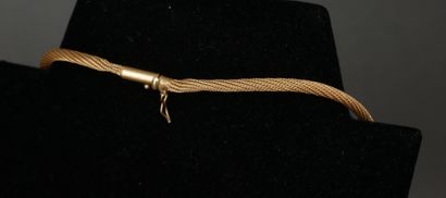 Collier tubogaz torsadé en or jaune 18k.
L...