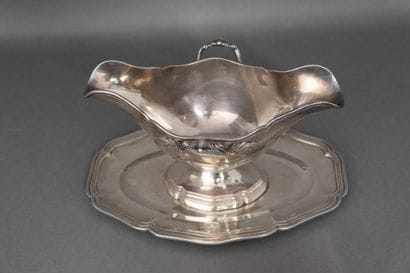 Double sauceboat with two leafy handles and...