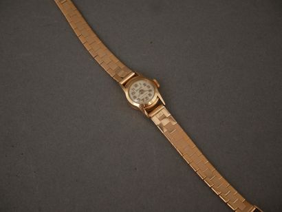 DERMONT
Bracelet-montre de dame en or jaune...
