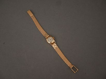 DERMONT
Bracelet-montre de dame en or jaune...