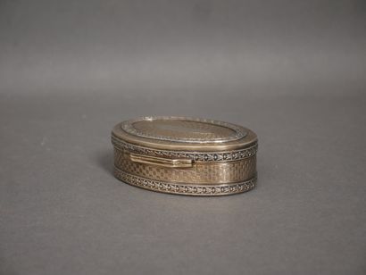 Oval silver and 950°/°° vermeil box with...