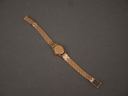 DERMONT
Bracelet-montre de dame en or jaune...