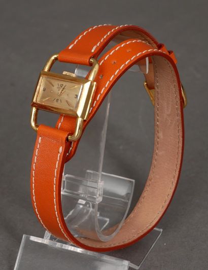 Jean PERRET 
Montre de dame en or jaune 18k,...