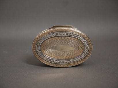 Oval silver and 950°/°° vermeil box with...