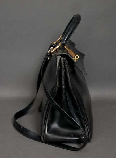 HERMES Paris 
Kelly bag in black box calfskin,...