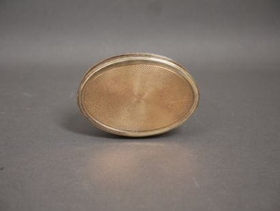 Oval silver and 950°/°° vermeil box with...