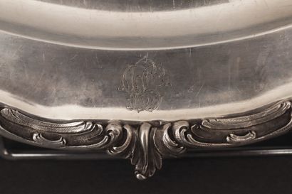 Oval dish with raised scrolls and shells...
