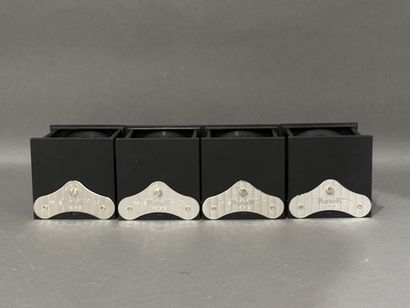 SWISS KUBIK, Genève. 
Quatre remontoirs à...