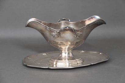 Double sauceboat with two leafy handles and...
