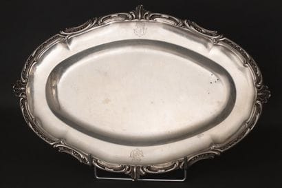 Oval dish with raised scrolls and shells...