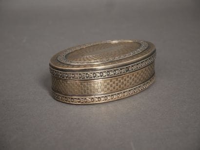 Oval silver and 950°/°° vermeil box with...