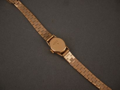 DERMONT
Bracelet-montre de dame en or jaune...