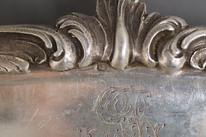 Oval dish with raised scrolls and shells...
