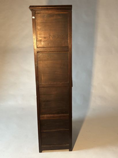 Standing man in natural wood carved with...