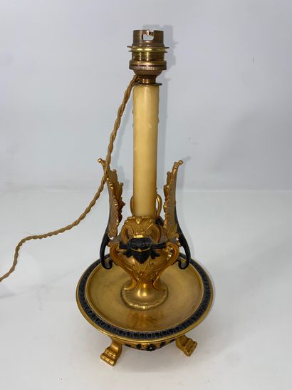 Gilt bronze and brown patina bronze candlestick,...