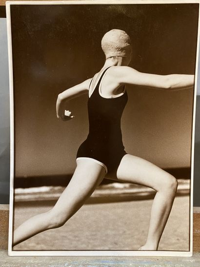 Modern school Swimmer exercising on the beach...