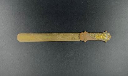 Engraved brass paper-knife, patinated metal...
