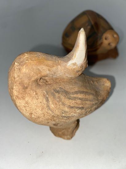 Lot comprising: - 1 ceramic dog lying on...