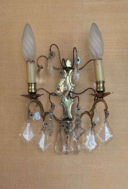 Four two-arm gilt-metal sconces with pendants...