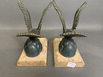 Pair of bookends in patinated metal on a...