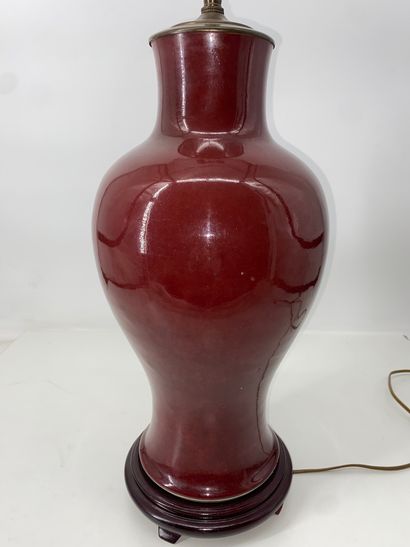 Porcelain baluster vase with oxblood glaze,...