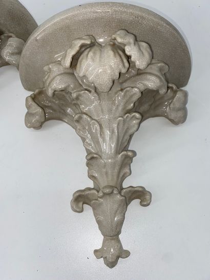 Pair of wall brackets in cracked porcelain...