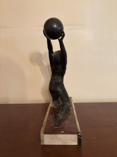 J. SALVADO Kneeling woman dancing with a...