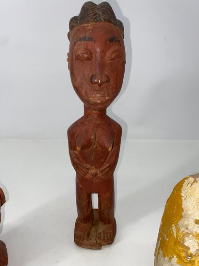 Funerary mask in partially yellow enameled...