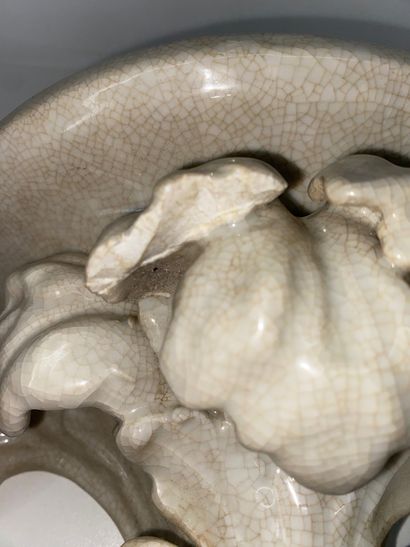 Pair of wall brackets in cracked porcelain...