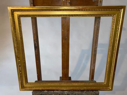 Carved and gilded wood frame, Louis XV style....