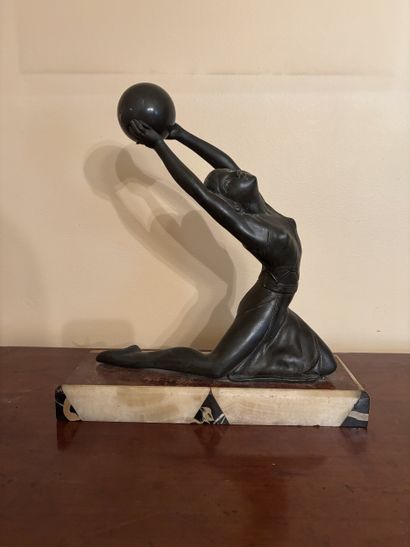 J. SALVADO Kneeling woman dancing with a...