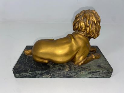 Gilded bronze paperweight of a dog lying...
