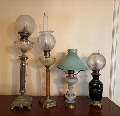 Four mismatched, electrified oil lamp feet...