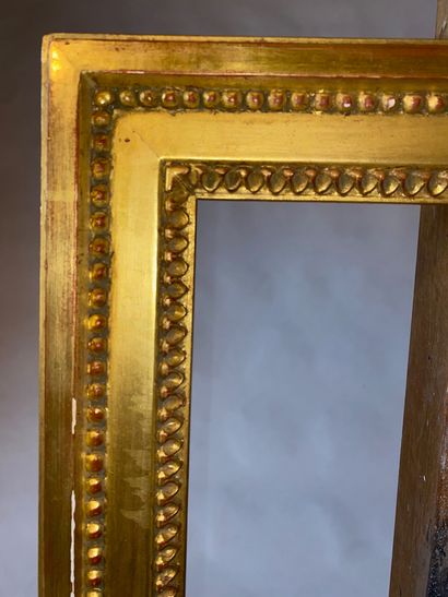 Carved and gilded wood frame, Louis XV style....