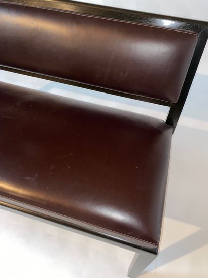 Black lacquered wood bench with brown leather...
