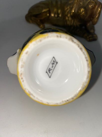 Porcelain inkwell, brass frame. Circa 1920....