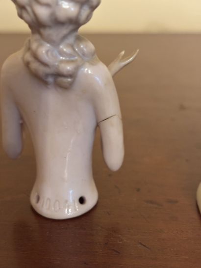 Three polychrome porcelain busts of women...