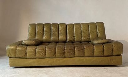 Three-seater green leather sofa, work of...