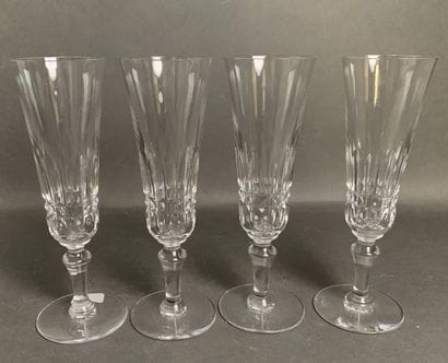 BACCARAT Four cut-crystal champagne flutes,...