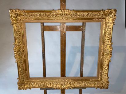 Carved and gilded wood frame, Louis XV style....