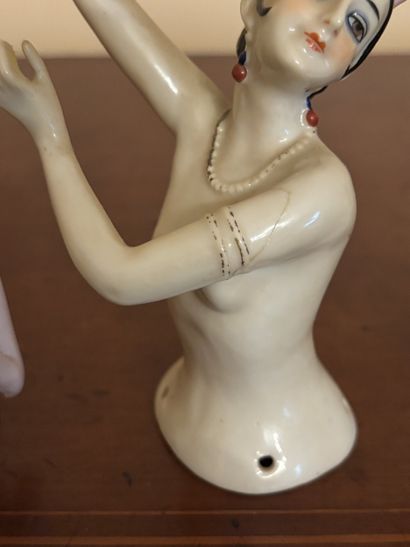 Three polychrome porcelain busts of women...